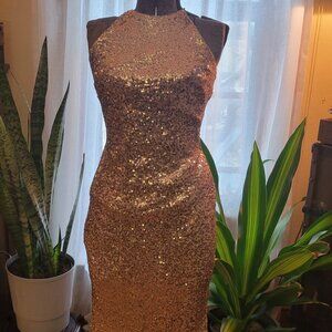 Badgley Mischka floor length, gold, formal dress. Fitted halter top SIZE 10